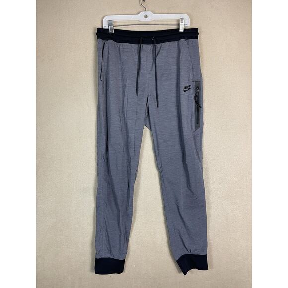 Nike Pants Womens Medium Gray Bonded Woven Tech Tapered Lightweight Jogger - Picture 1 of 12
